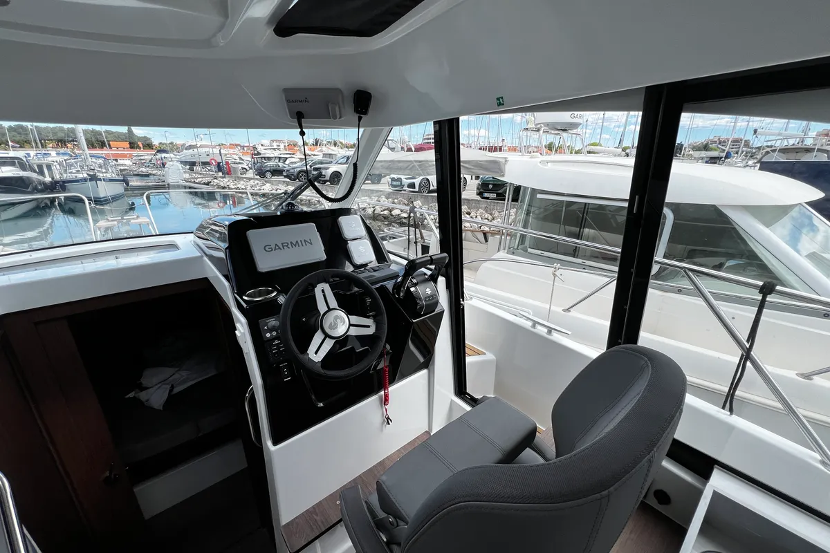 Cockpit of Ana, a Beneteau Antares 9 OB motorboat at Grad Pula, Croatia