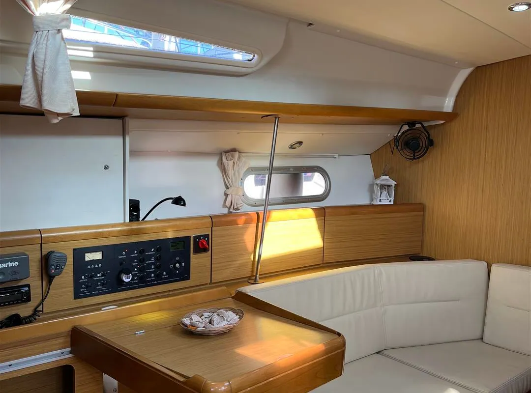Salon of Waterproof, a Jeanneau Sun Odyssey 42 i sailboat at Lavreotiki Municipal Unit, Greece