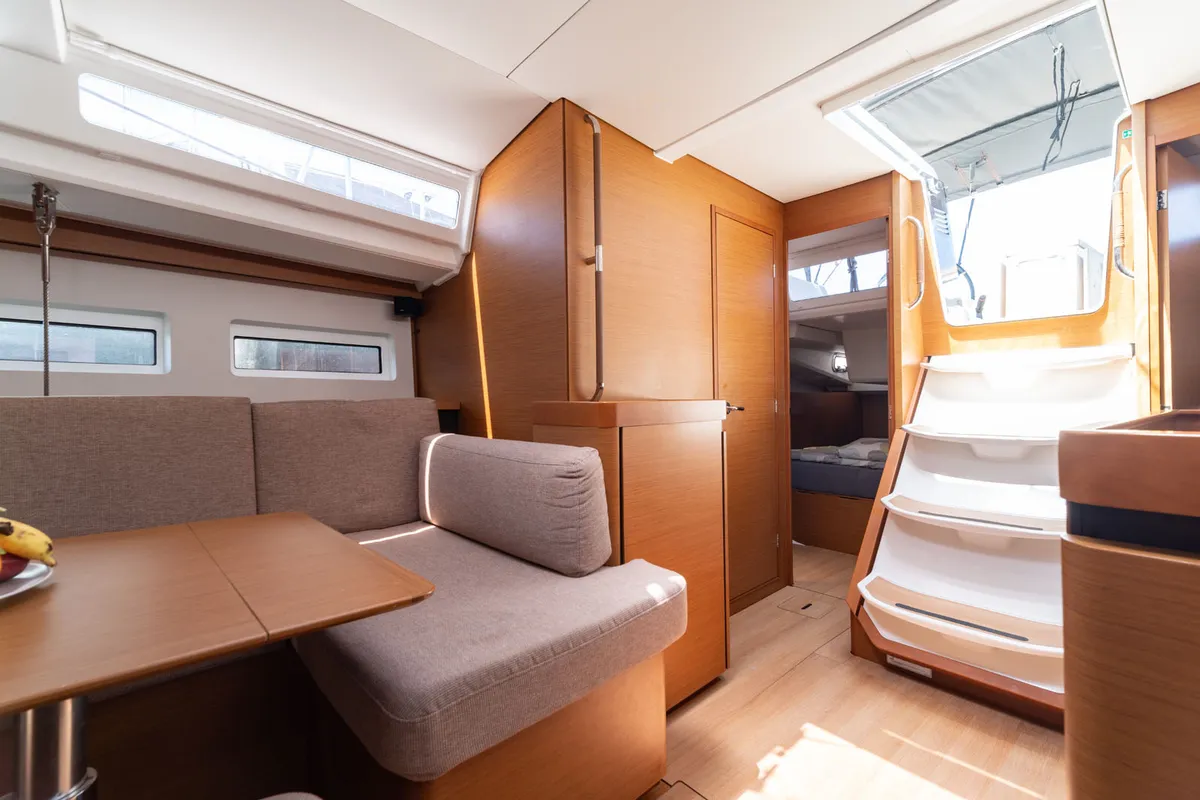 Salon of free elli, a Jeanneau Sun Odyssey 440 sailboat at Felanitx, Spain
