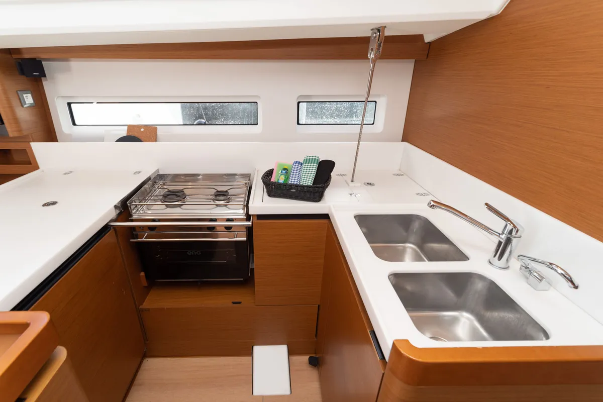 Galley of free elli, a Jeanneau Sun Odyssey 440 sailboat at Felanitx, Spain