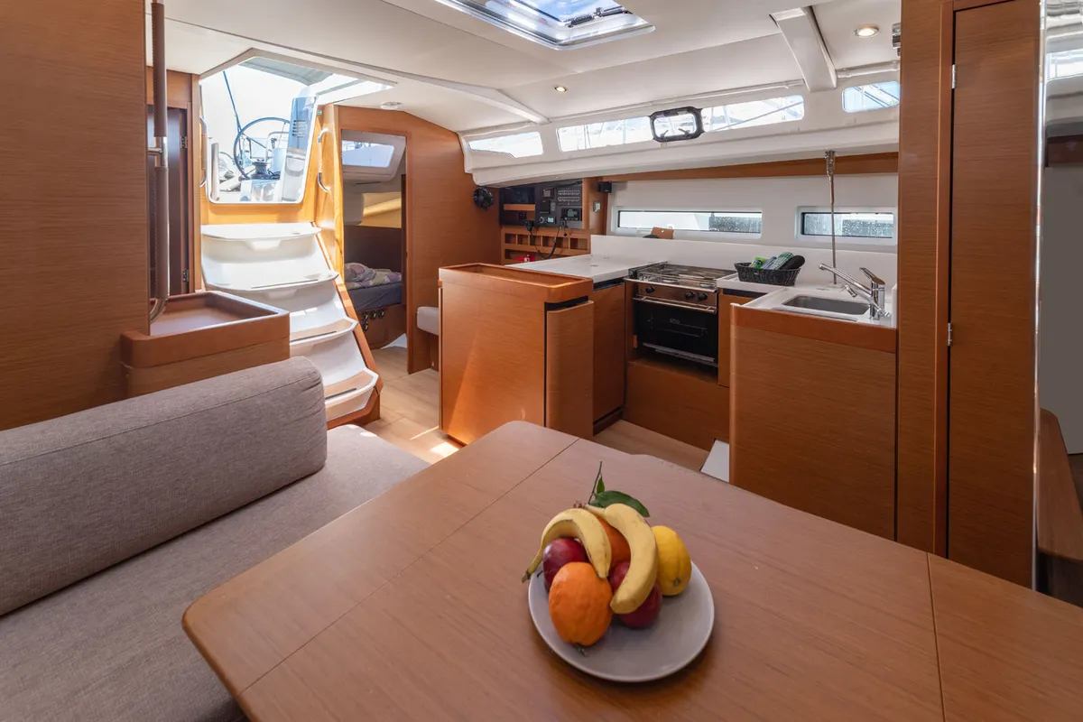 Salon of free elli, a Jeanneau Sun Odyssey 440 sailboat at Felanitx, Spain