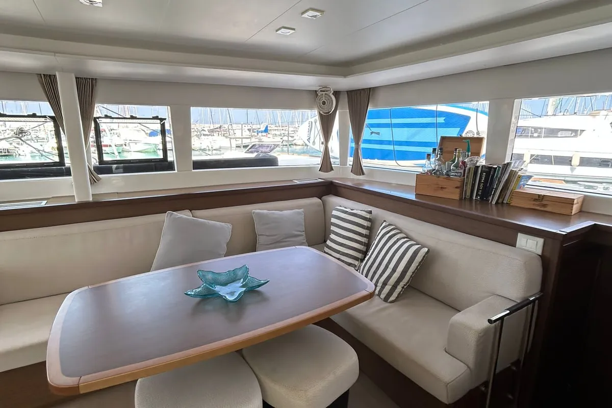 Salon of Rivincita, a Lagoon 450 catamaran at Olbia, Italy