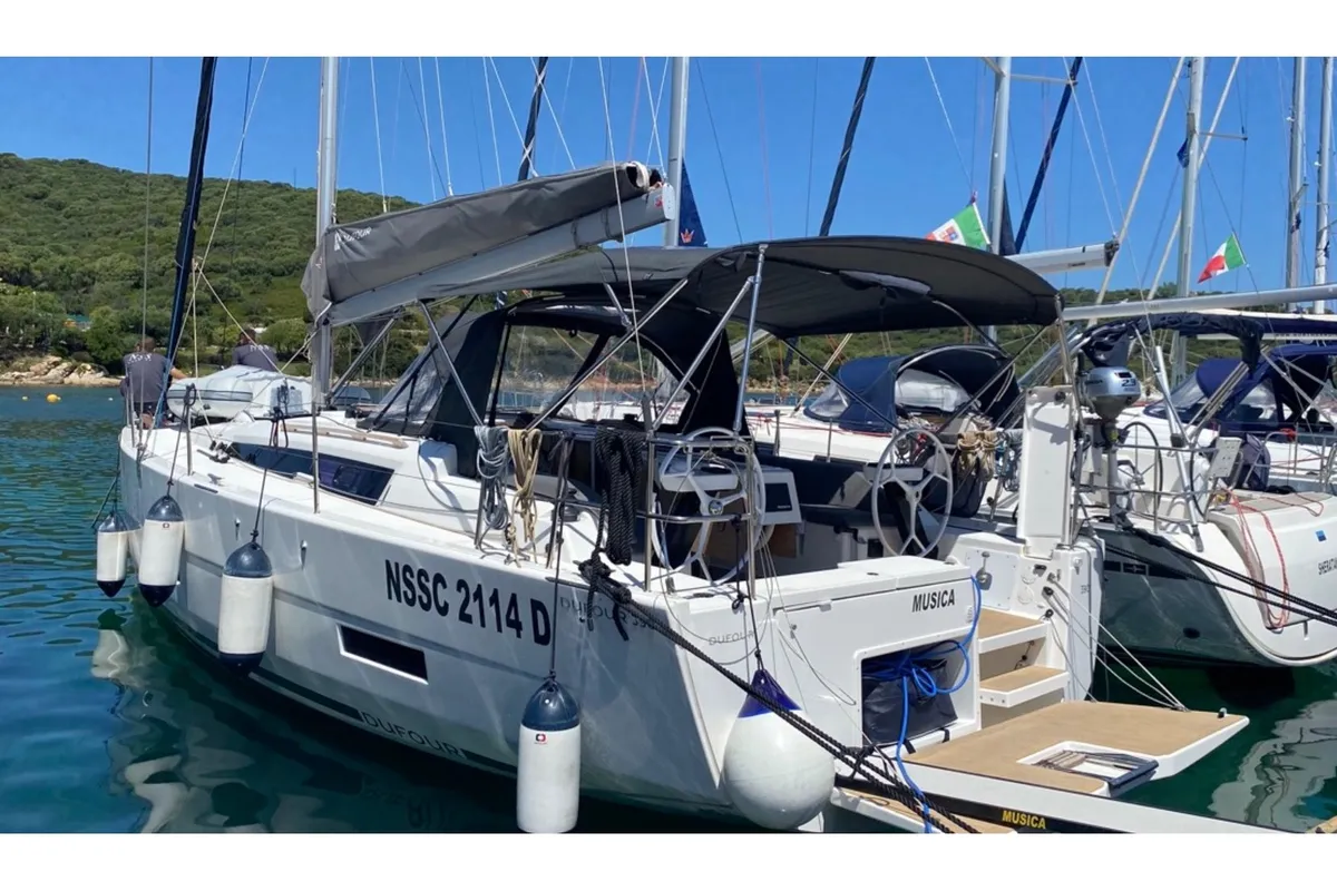 Exterior view of Musica, a Dufour 390 Grand Large sailboat at Olbia, Italy