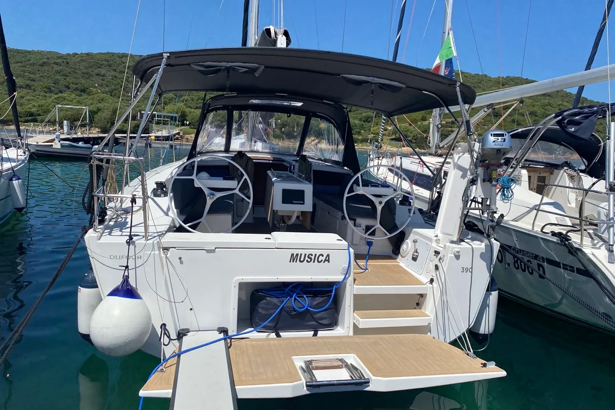 Exterior view of Musica, a Dufour 390 Grand Large sailboat at Olbia, Italy