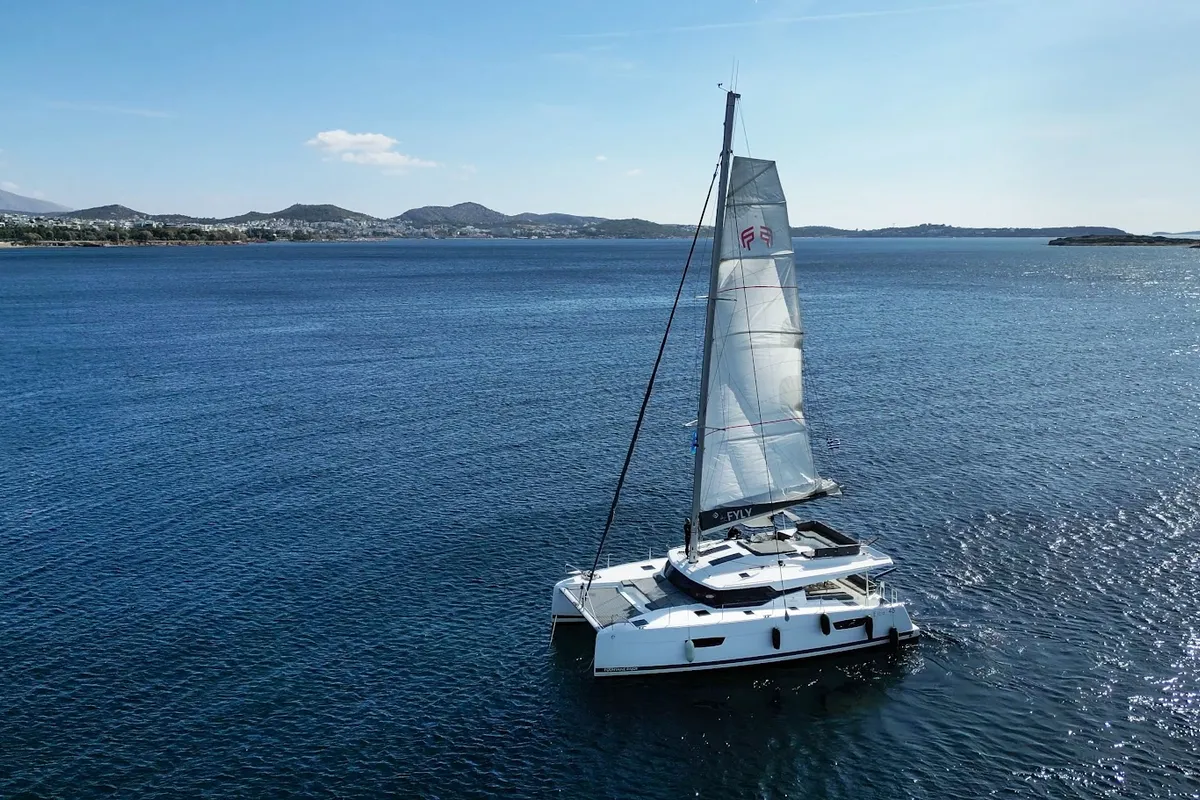 Exterior view of Olympus - Green Wave, a Fountaine Pajot Elba 45 catamaran at Athens, Greece