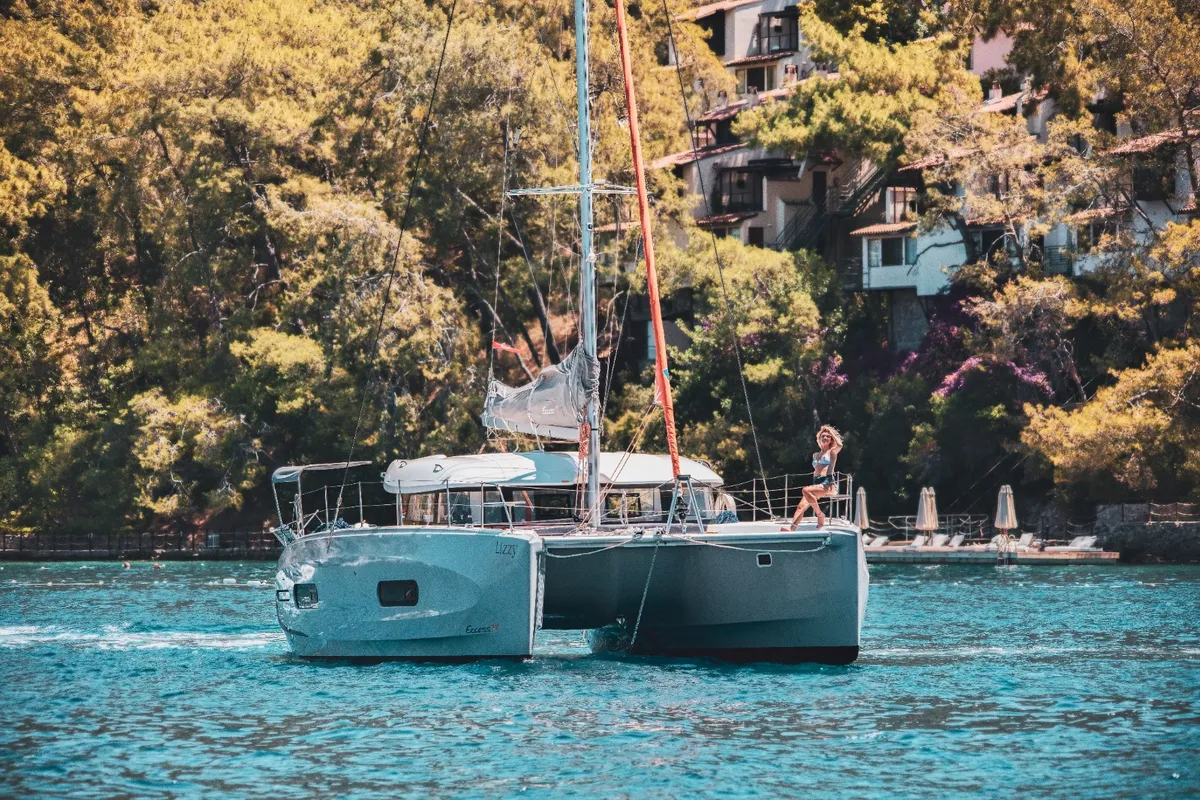 Exterior view of Lizzy, a Excess 11 - 4 + 1 + 1 cab. catamaran at Fethiye, Turkey