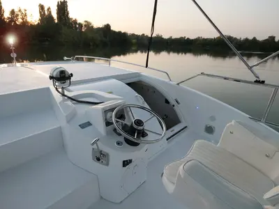 Cockpit of Houseboat Holidays Italia S.R.L. Minuetto 8, a motor yacht at Casier, Italy
