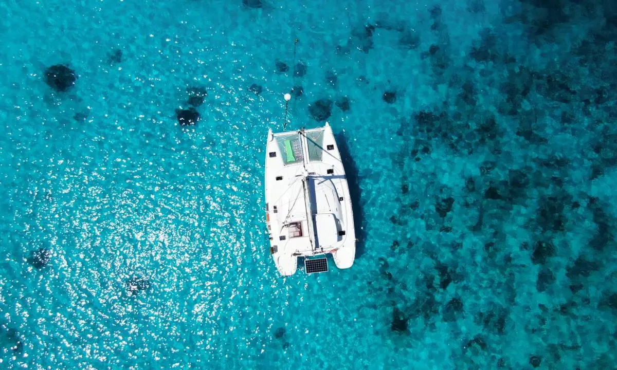 Exterior view of Modjo, a Lagoon 380 S2 catamaran at Roche Caiman, Seychelles