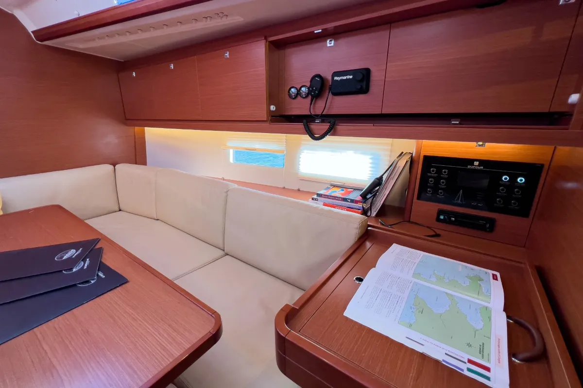 Salon of Cuir Noir, a Dufour 390 Grand Large sailboat at Bocca di Magra, Italy