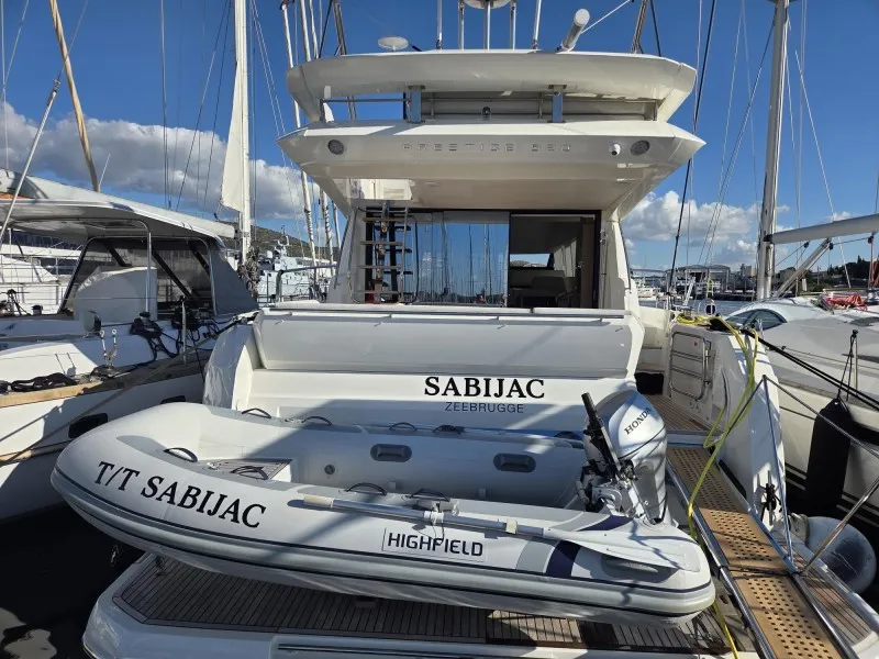 Exterior view of Sabijac, a Jeanneau Prestige 520 Flybridge motor yacht at Grad Šibenik, Croatia