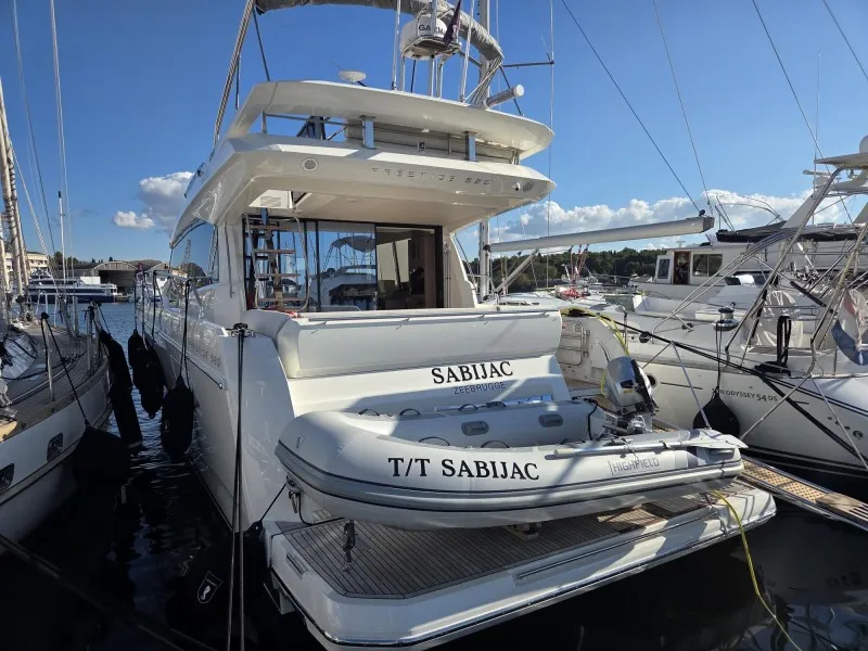 Exterior view of Sabijac, a Jeanneau Prestige 520 Flybridge motor yacht at Grad Šibenik, Croatia