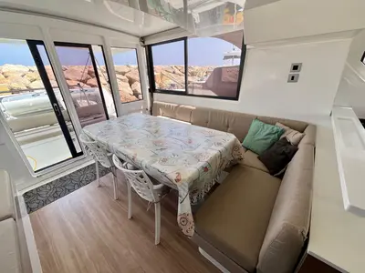 Salon of Les Evadees, a Bali Catspace OW catamaran at Hyères, France