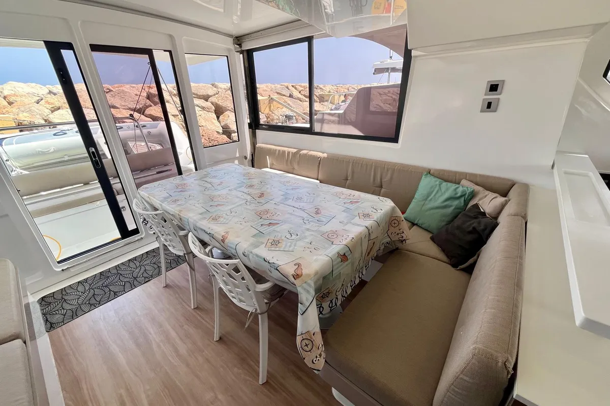 Salon of Les Evadees, a Bali Catspace OW catamaran at Hyères, France