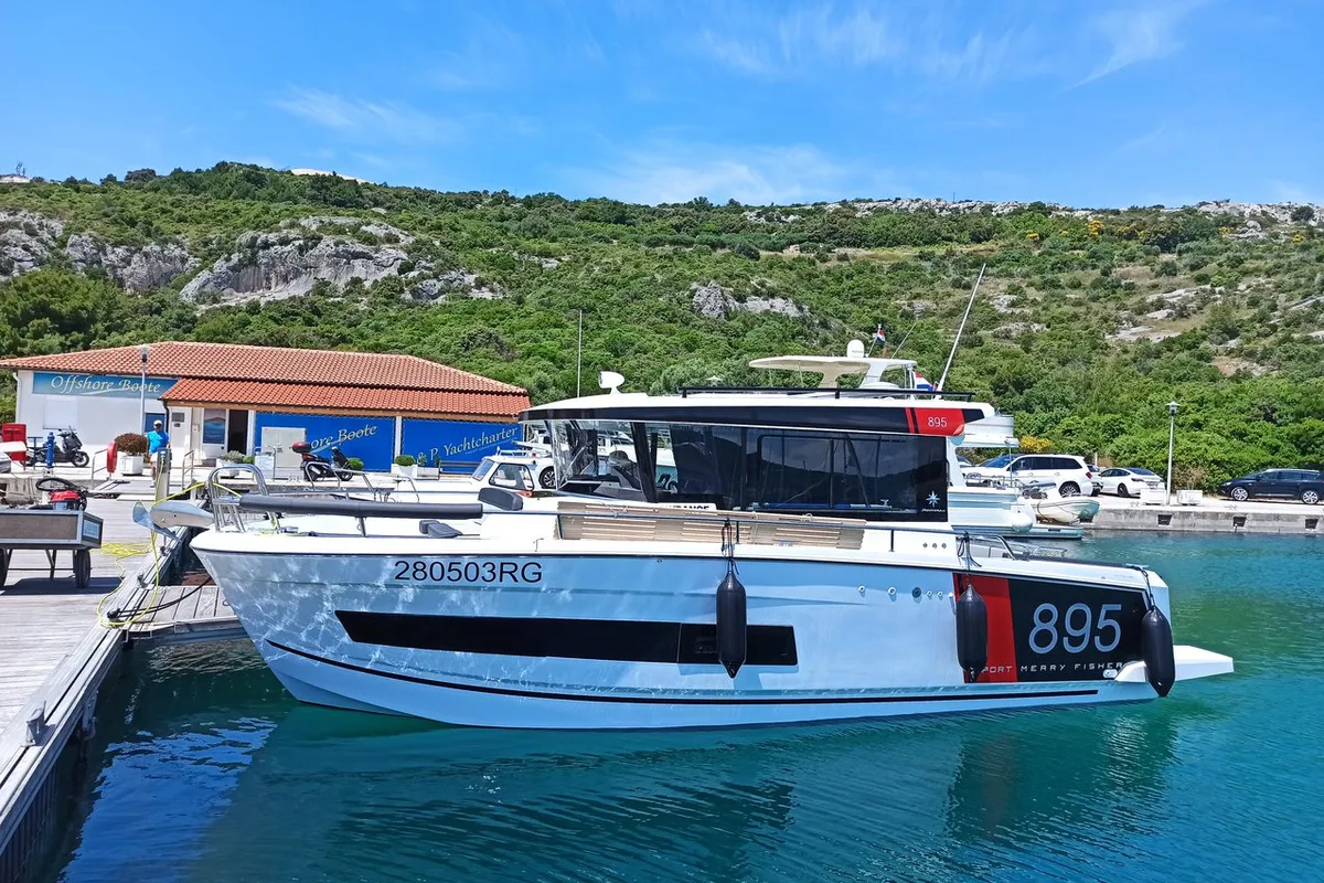 Exterior view of Surprise, a Jeanneau Merry Fisher 895 Sport Offshore motorboat at Punat, Croatia