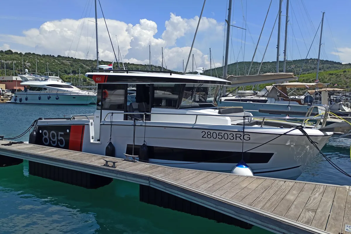 Exterior view of Surprise, a Jeanneau Merry Fisher 895 Sport Offshore motorboat at Punat, Croatia