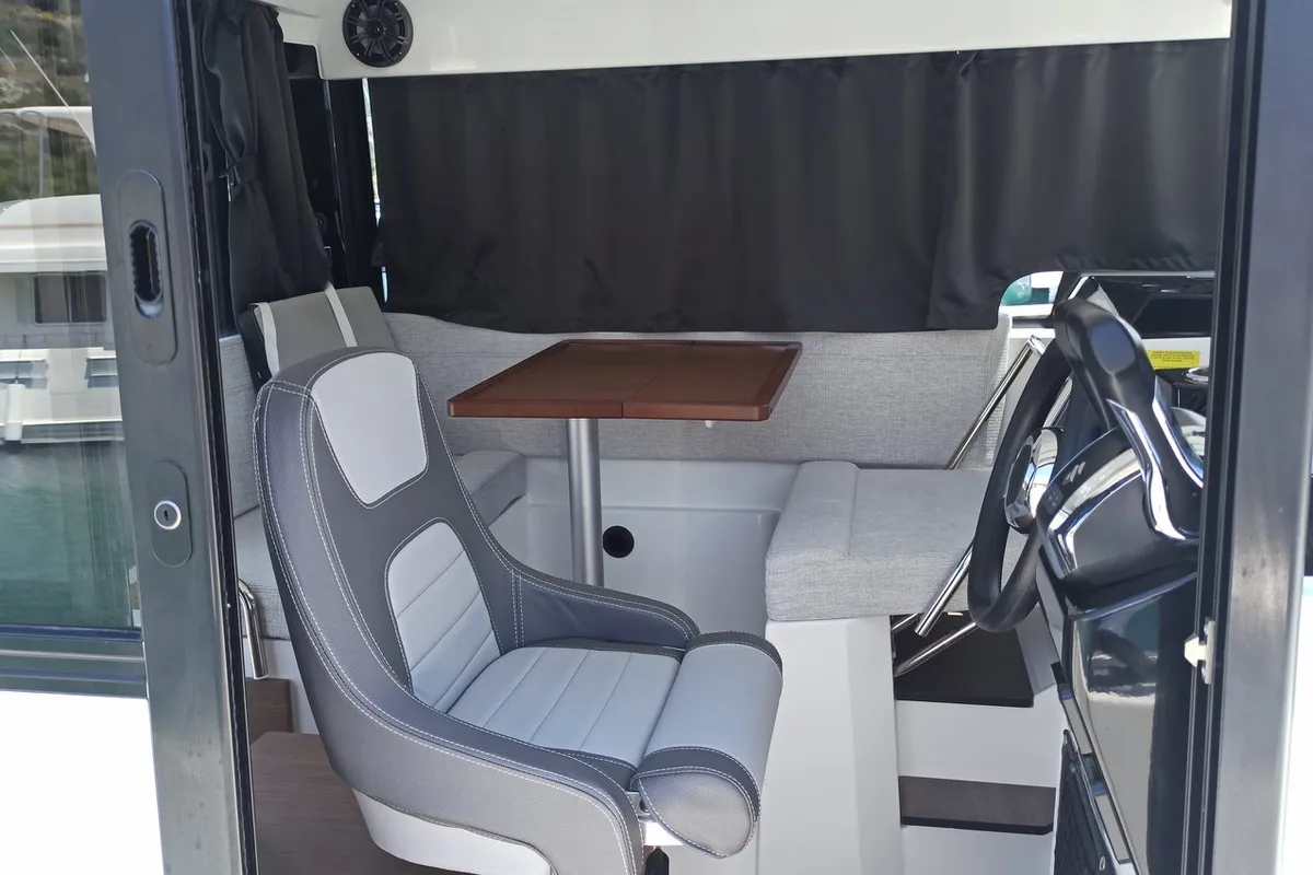 Salon of Surprise, a Jeanneau Merry Fisher 895 Sport Offshore motorboat at Punat, Croatia