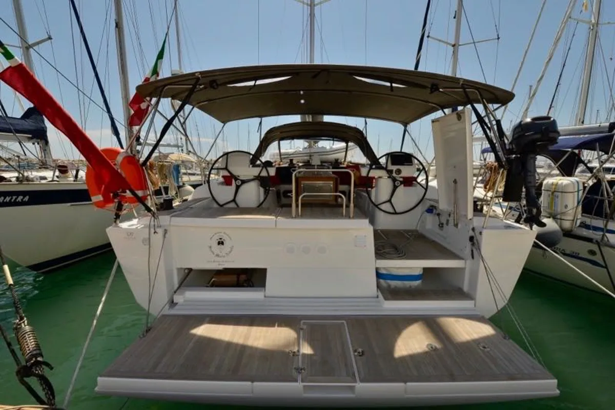 Deck of Santa Maria Novella, a Dufour 520 GL - 4. cab sailboat at Cecina, Italy
