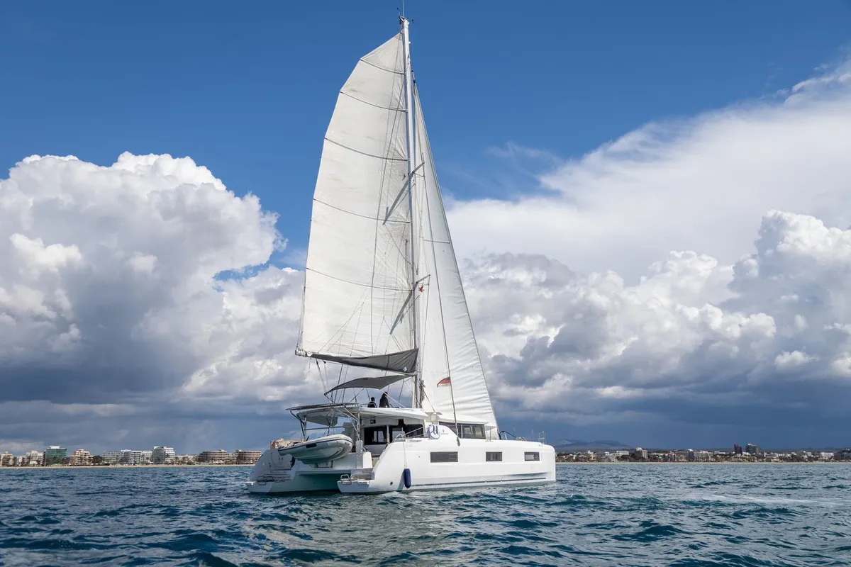 Exterior view of Voyager, a Lagoon 46 catamaran at Palma de Mallorca, Spain