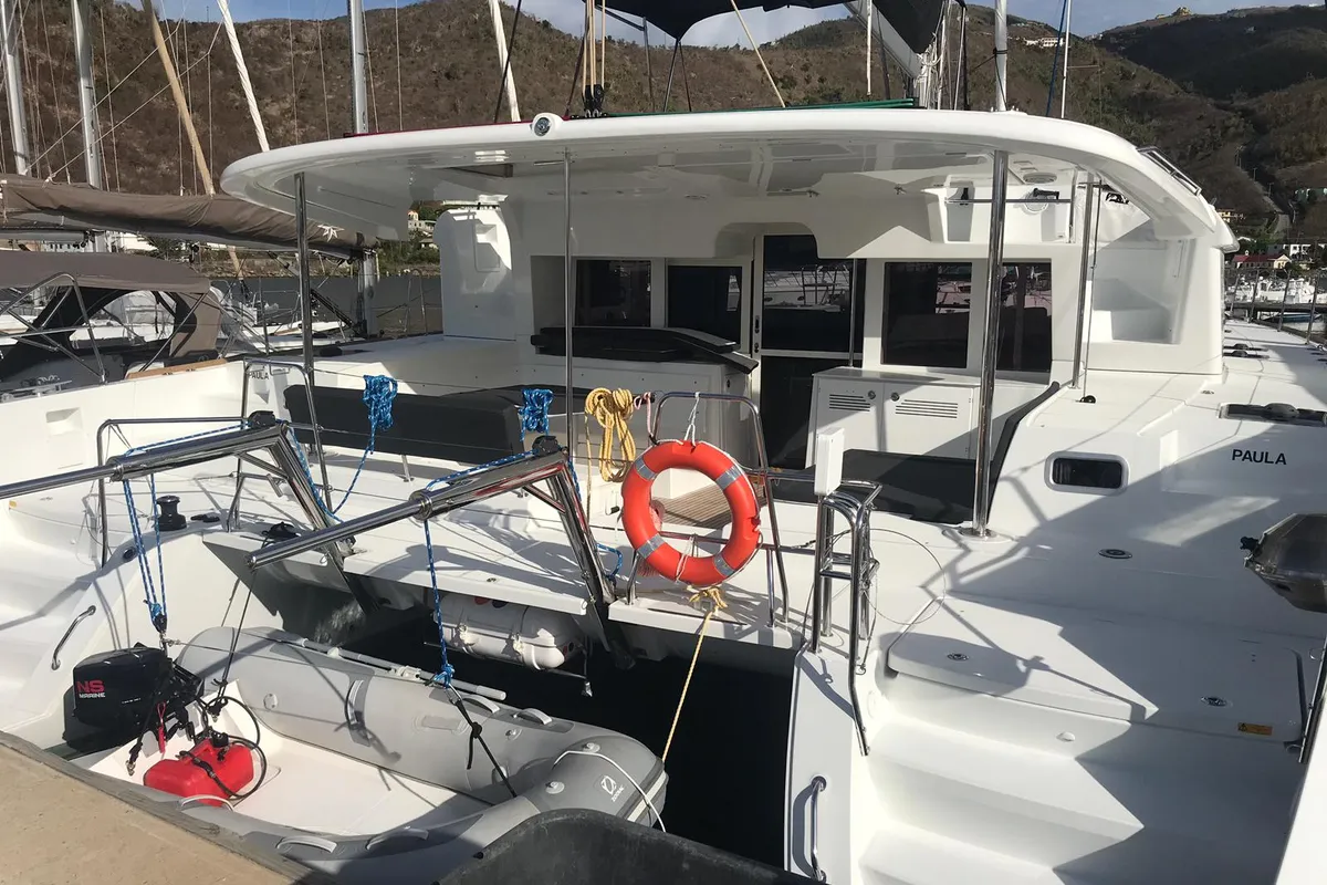 Paula, a Lagoon 450 Fly catamaran at Sant Antoni de Portmany, Spain