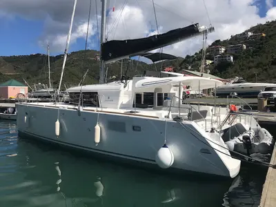 Paula, a Lagoon 450 Fly catamaran at Sant Antoni de Portmany, Spain