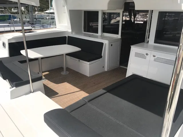 Paula, a Lagoon 450 Fly catamaran at Sant Antoni de Portmany, Spain