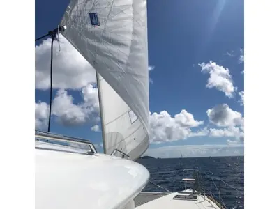 Paula, a Lagoon 450 Fly catamaran at Sant Antoni de Portmany, Spain