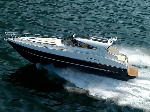 Exterior view of Champagne Three, a Primatist G 46 motorboat at Cannigione, Italy