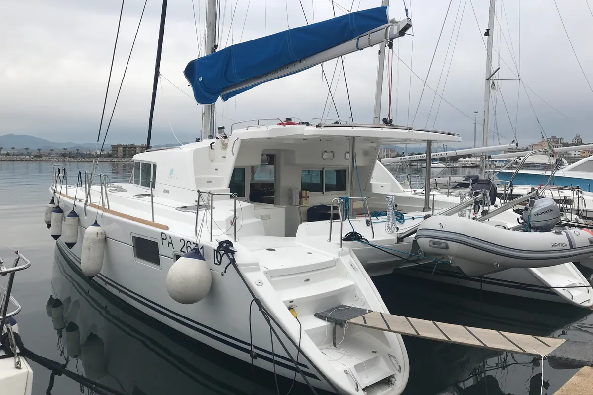 Exterior view of Isis, a Lagoon 440 catamaran at Olbia, Italy