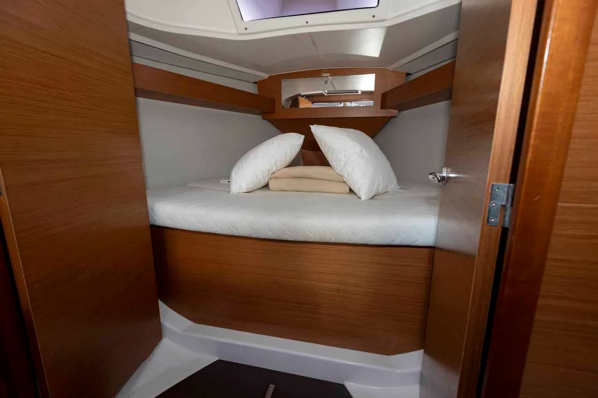 Cabin on Shakey Ground, a Dufour 360 GL sailboat at Figari/Golfo Aranci, Italy