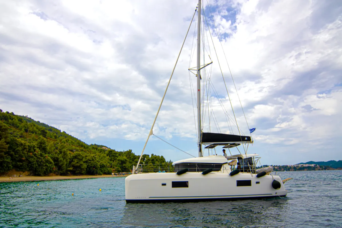 Exterior view of ZAKI, a Lagoon 42 catamaran at Skiathos, Greece
