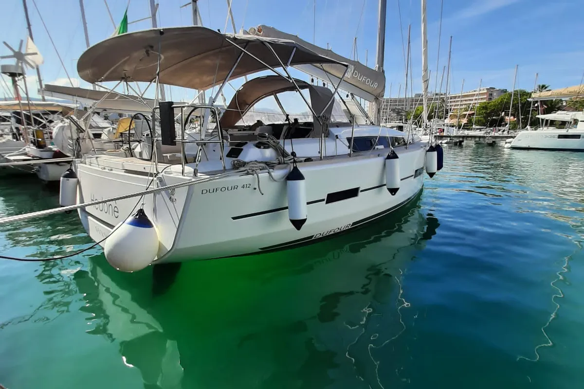 Exterior view of Hedoné, a Dufour 412 Grand large sailboat at Tonnarella, Italy
