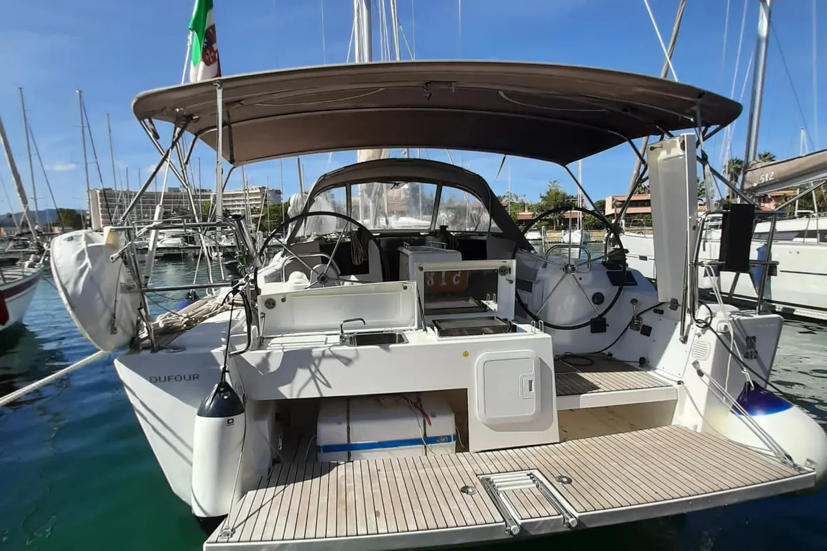 Deck of Hedoné, a Dufour 412 Grand large sailboat at Tonnarella, Italy