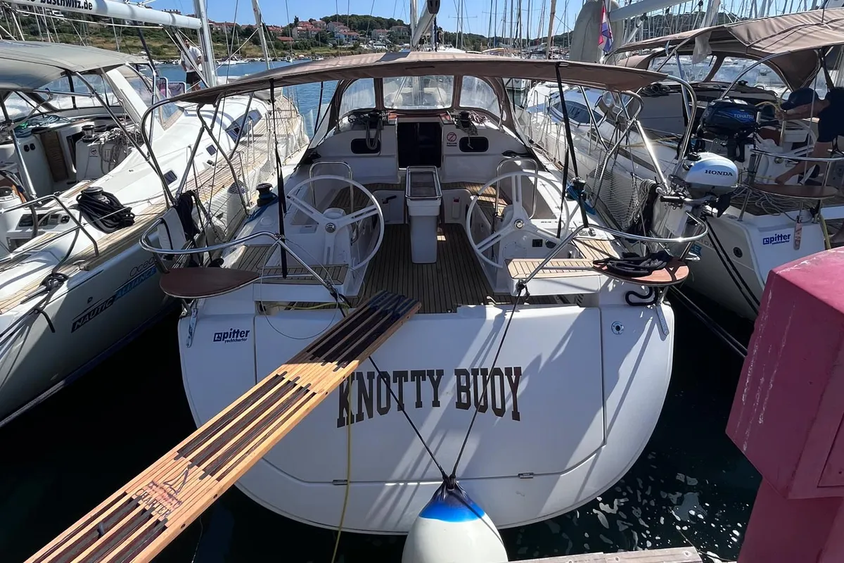 Exterior view of Knotty Buoy, a Elan Impression 45 sailboat at Grad Pula, Croatia