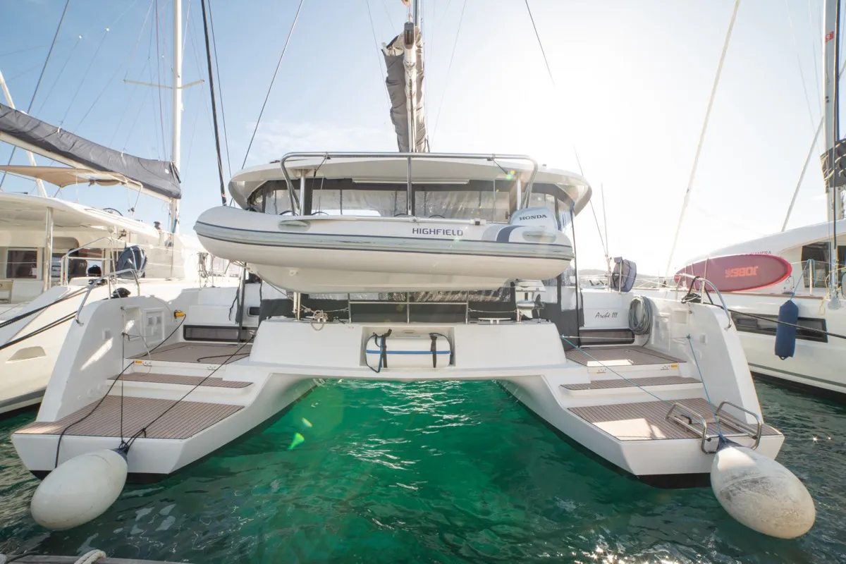 Exterior view of Archè III, a Lagoon 42 catamaran at Olbia, Italy
