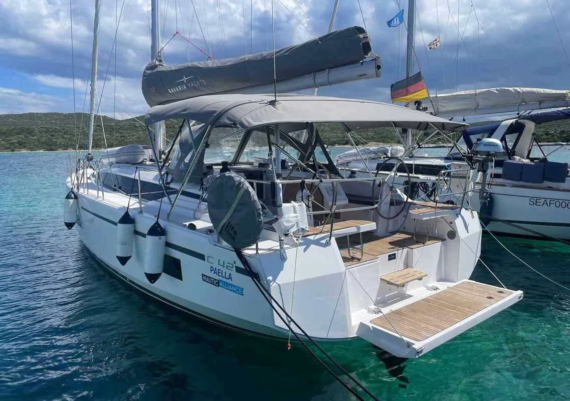 Exterior view of Paella, a Bavaria C42 sailboat at Figari/Golfo Aranci, Italy