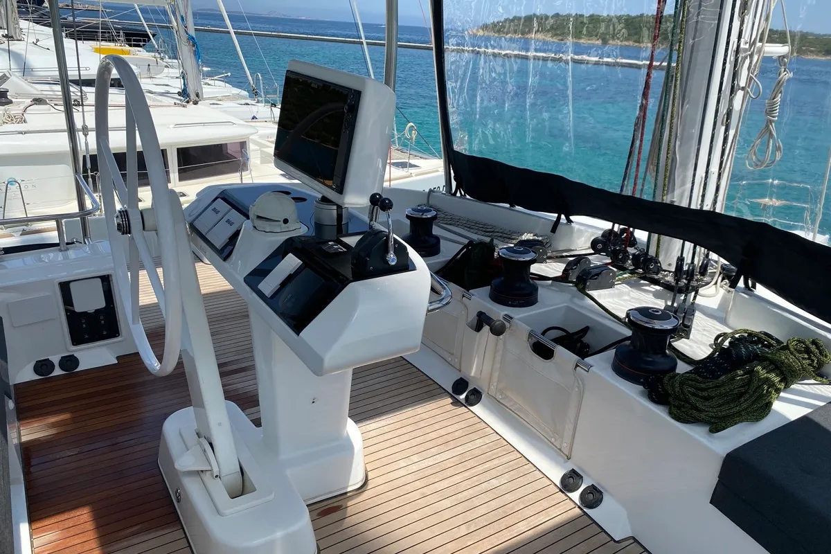 Cockpit of Naka, a Lagoon 52F catamaran at Tonnarella, Italy