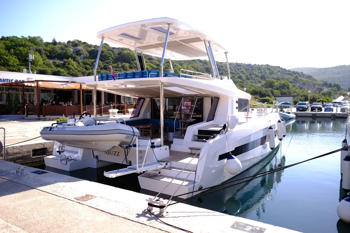 Exterior view of Abuzz, a Cervetti 44 Power catamaran at Primošten, Croatia