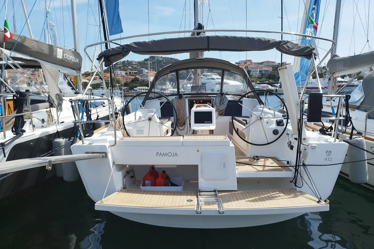 Exterior view of Pamoja, a Dufour 412 sailboat at Olbia, Italy