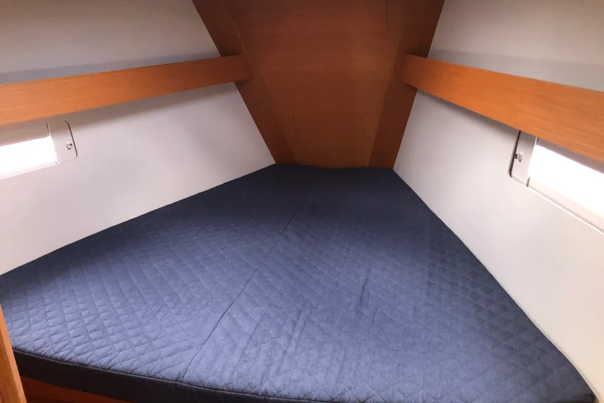Cabin on Pamoja, a Dufour 412 sailboat at Olbia, Italy