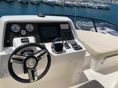 Cockpit of Sunrise, a Bavaria Virtess 420 Fly motorboat at Grad Trogir, Croatia