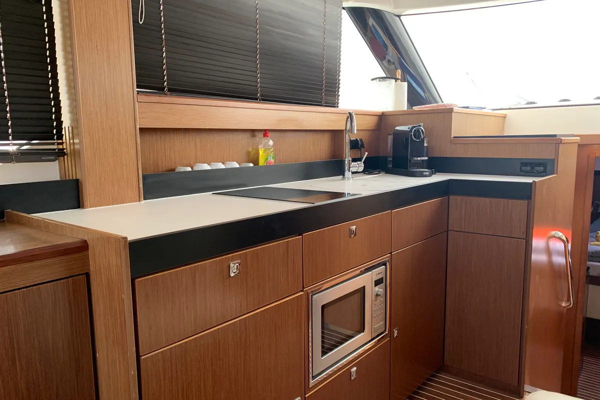 Galley of Sunrise, a Bavaria Virtess 420 Fly motorboat at Grad Trogir, Croatia