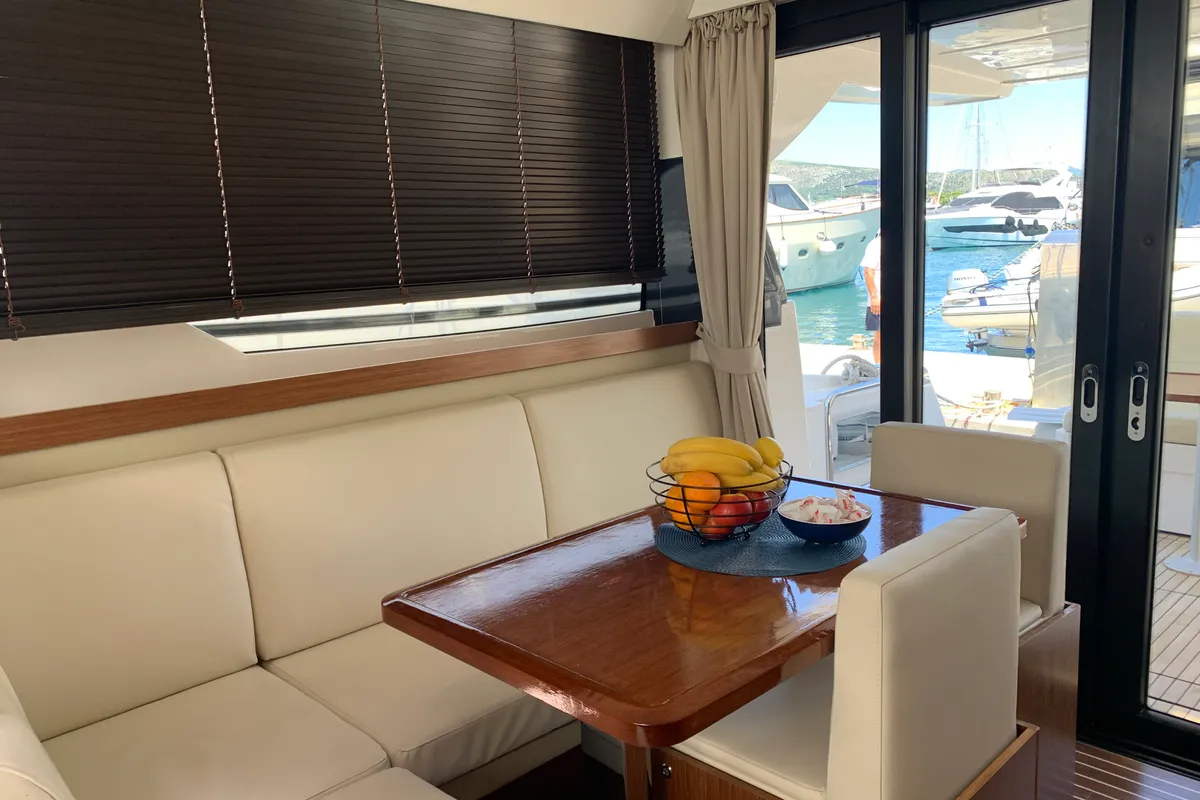 Salon of Sunrise, a Bavaria Virtess 420 Fly motorboat at Grad Trogir, Croatia