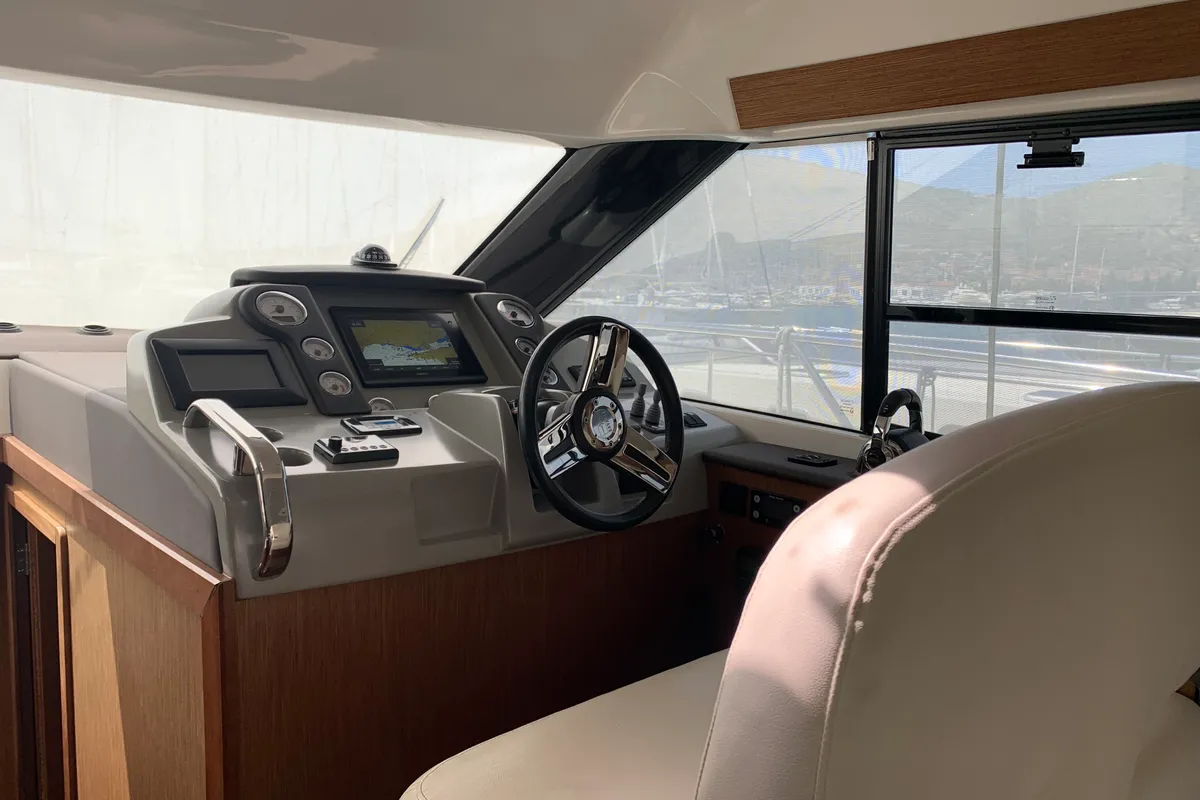 Cockpit of Sunrise, a Bavaria Virtess 420 Fly motorboat at Grad Trogir, Croatia
