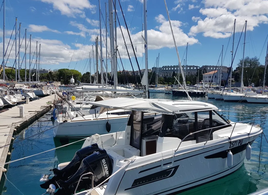 Exterior view of Riva, a Jeanneau Merry Fisher 895 motorboat at Grad Biograd na Moru, Croatia