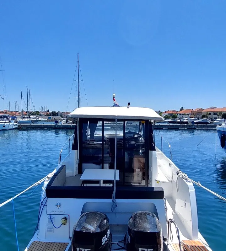 Exterior view of Riva, a Jeanneau Merry Fisher 895 motorboat at Grad Biograd na Moru, Croatia