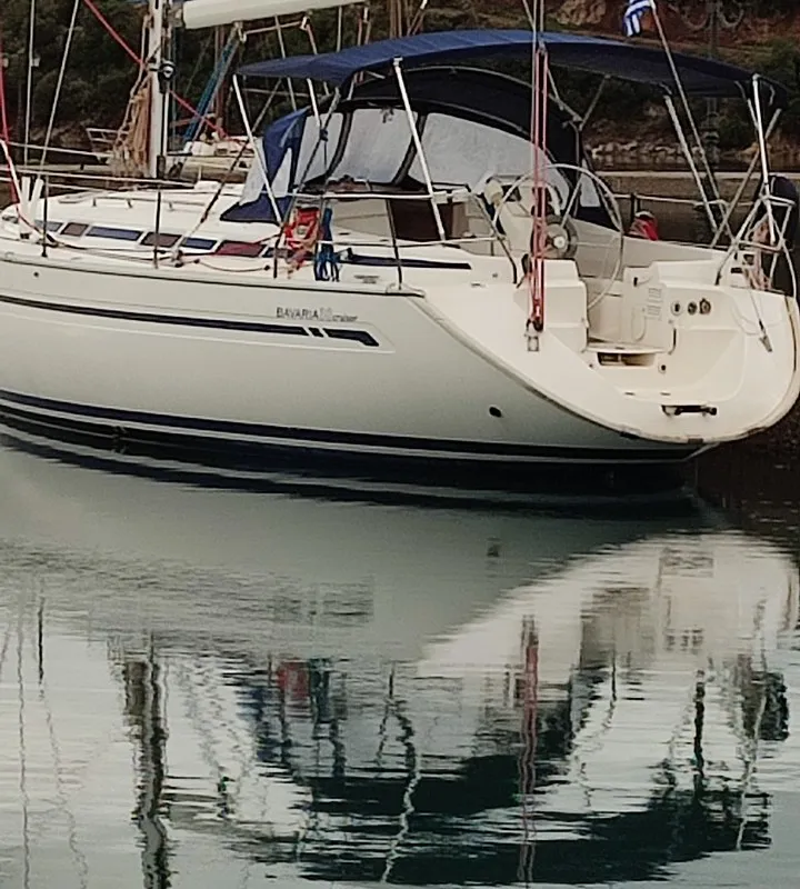 Exterior view of Tritonas, a Bavaria 38 Cruiser sailboat at Municipal Unit of Ellomenos, Greece