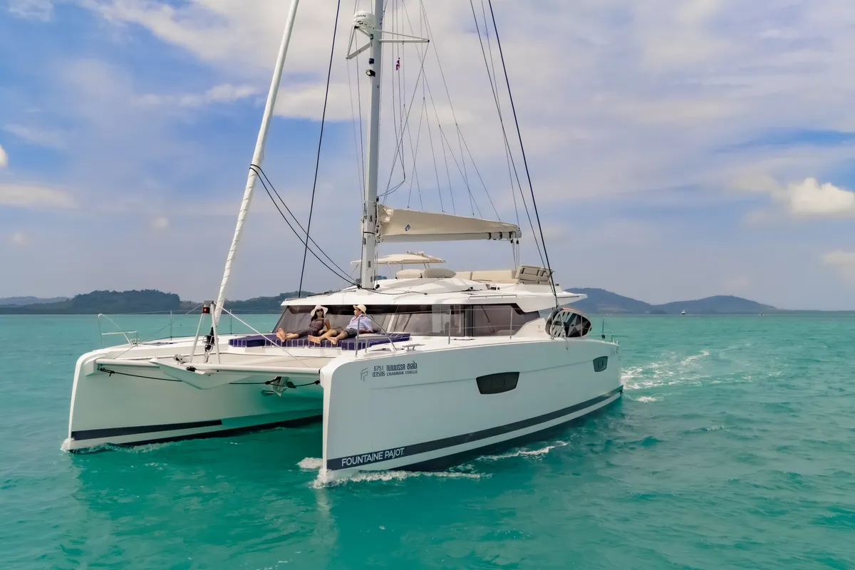 Exterior view of Chammak Challo, a Fountaine Pajot Elba 45 catamaran at Mai Khao, Thailand