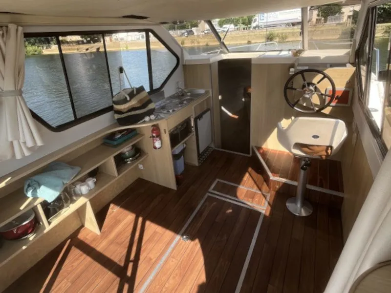 Cockpit of Pop, a Nicols Sedan 800 motorboat at Sablé-sur-Sarthe, France