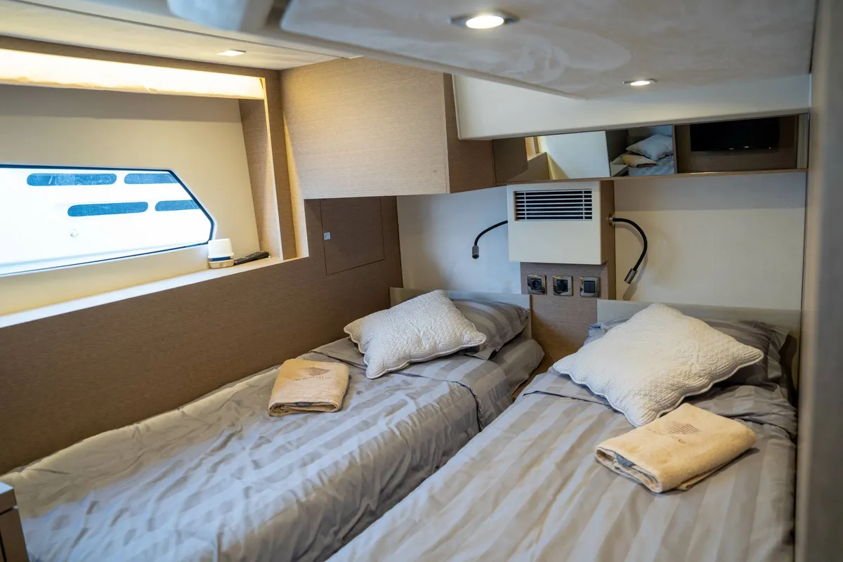 Cabin on Adudu 2, a Jeanneau Prestige 460 Fly motor yacht at Dubrovnik, Croatia