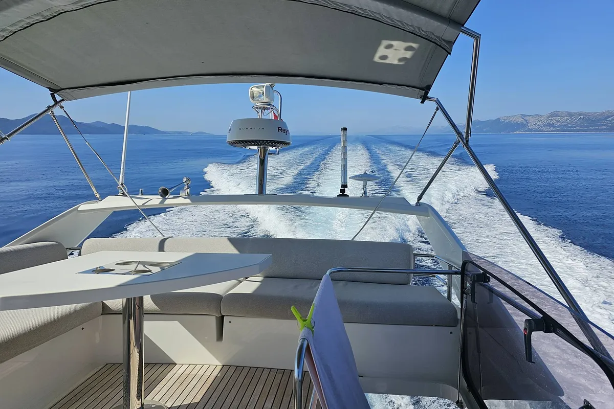 Deck of Adudu 2, a Jeanneau Prestige 460 Fly motor yacht at Dubrovnik, Croatia